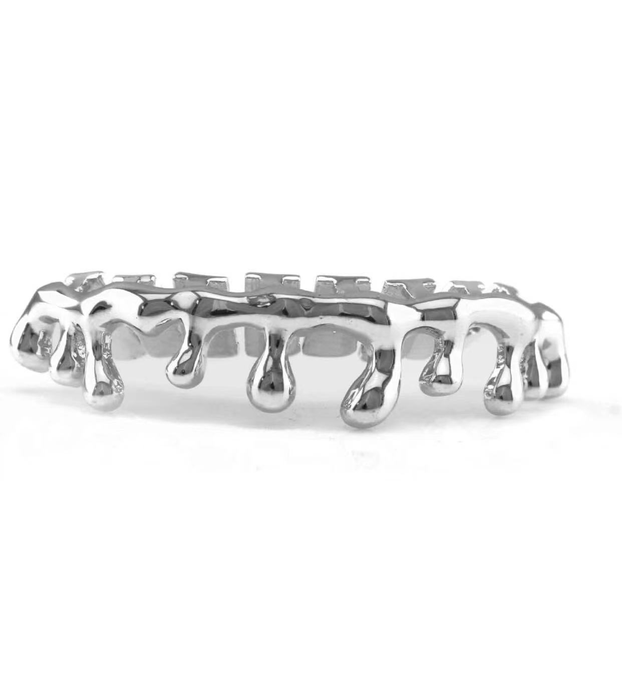 ヨーロッパとアメリカで人気の水滴型下歯ヒップホップ6歯と8歯 - Body Jewelry Europe のレビューと価格