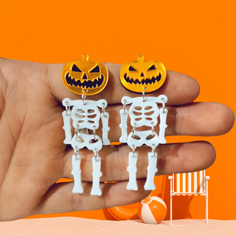 アクリル樹脂の頭蓋骨のイヤリング,ハロウィーンのパーティージ - Body Jewelry Europe のレビューと価格