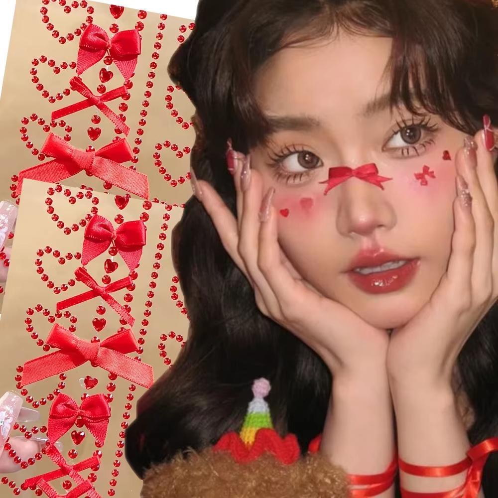1枚の赤いリボンリボンがキラキラ輝く工芸品顔ジュエリークリス - Body Jewelry Tattoo のレビューと価格